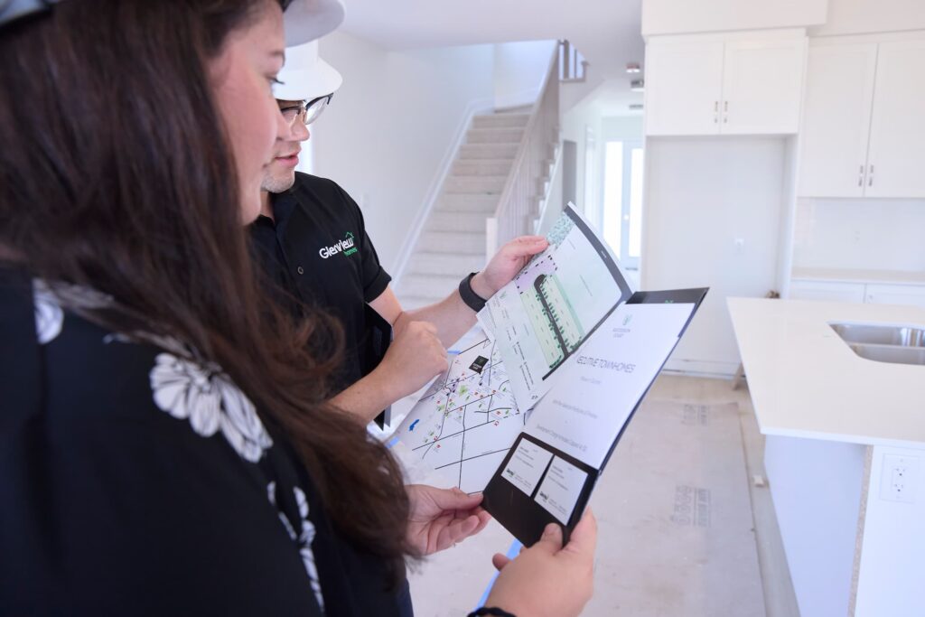 To people reviewing a document in a new home