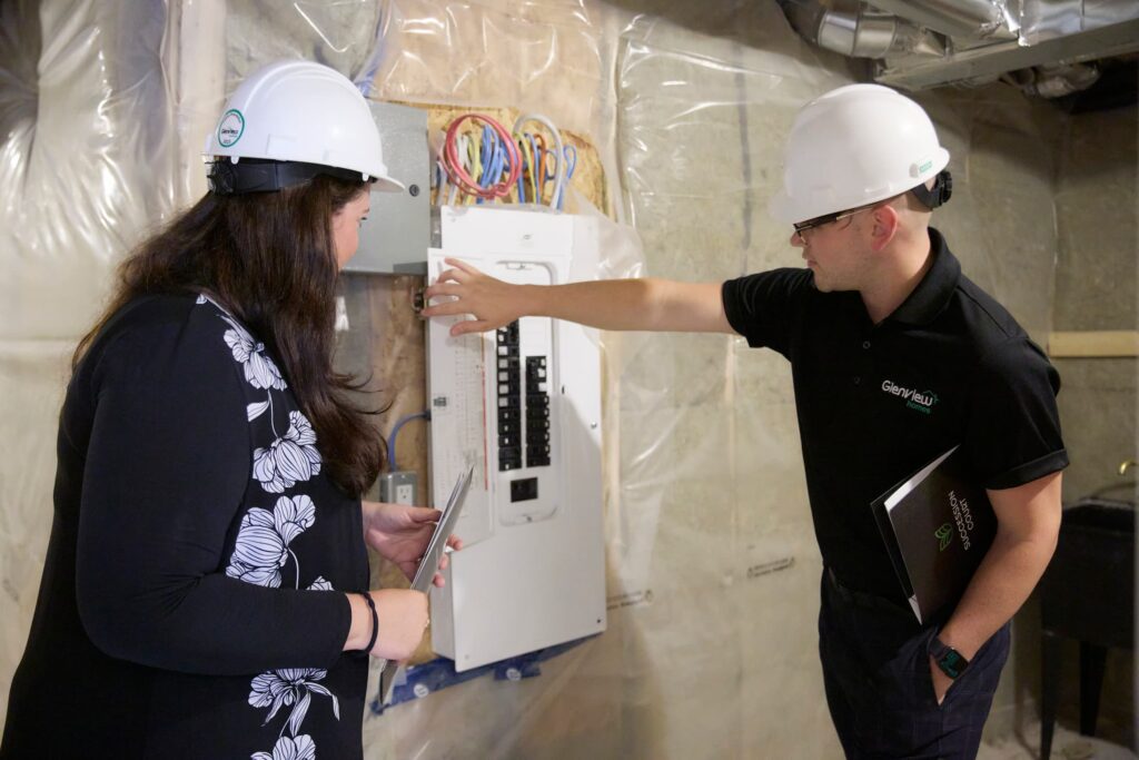 A glenview rep showing a client a fusebox