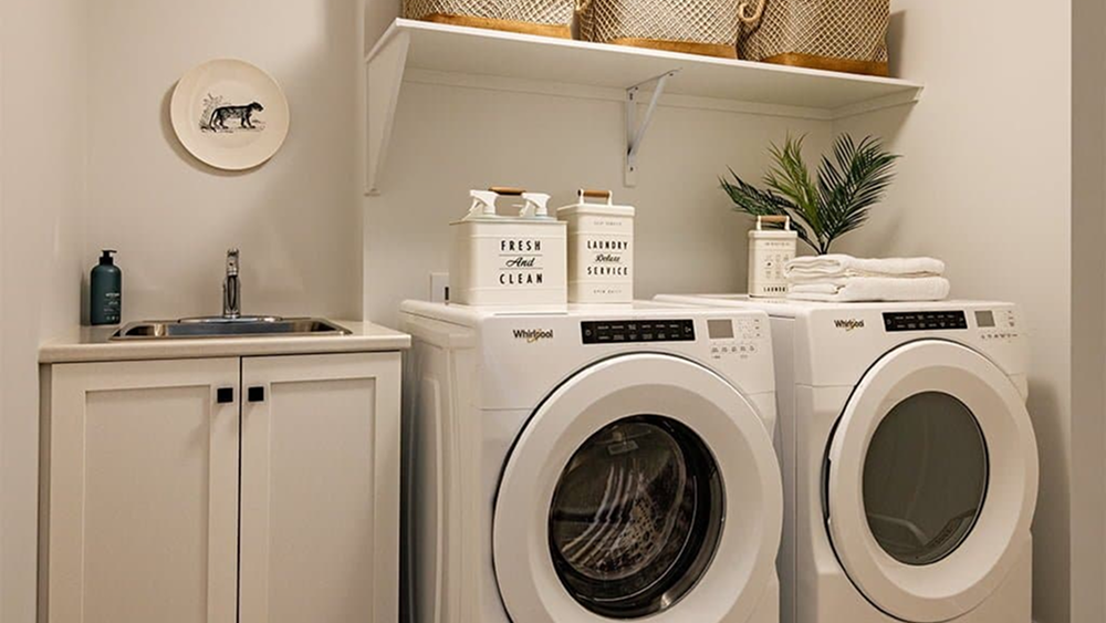 a washer and dryer in a utility room